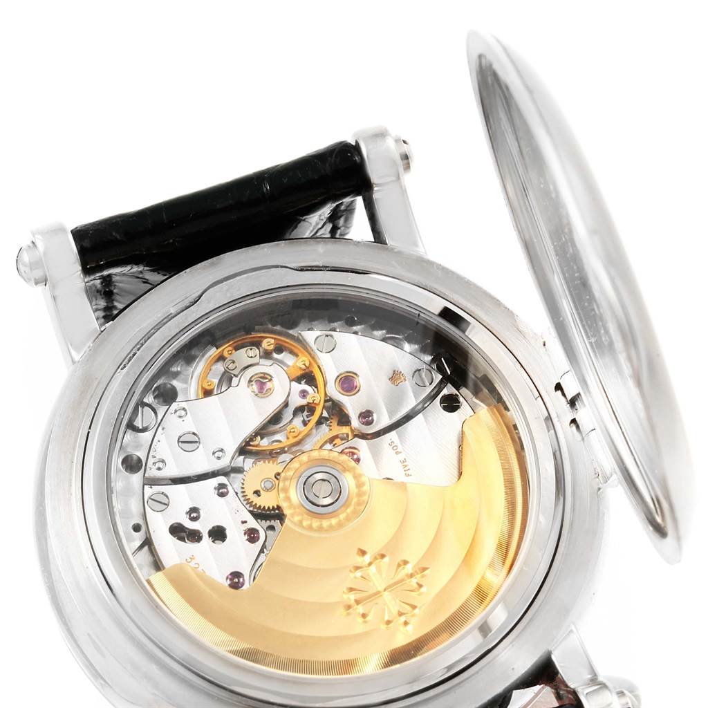 The image shows the movement and inner mechanics of the Patek Philippe 5059 Men
s White Gold White Dial 5059 Men
s White Gold White Dial Perpetual Calendar Retrograde 18k White Gold Watch 5059 model from the back.