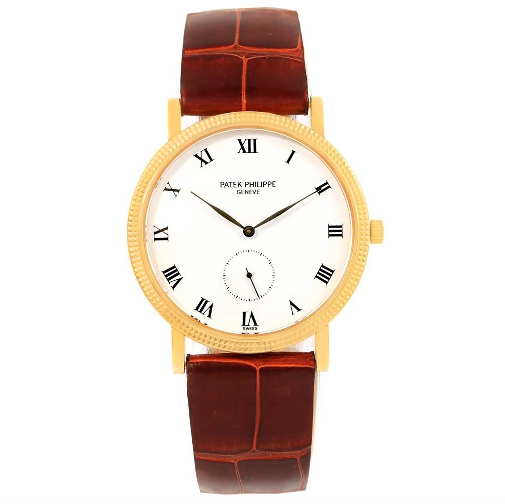 The image shows a front view of a Patek Philippe Calatrava 3919 Men's Yellow Gold White Dial 3919 Men's Yellow Gold White Dial watch with a brown leather strap.