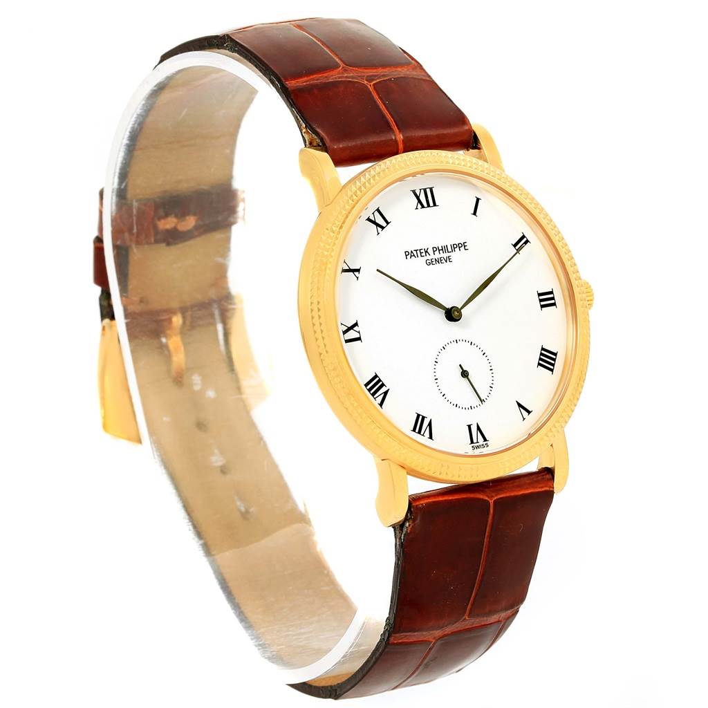 The image shows a front angled view of a Patek Philippe Calatrava 3919 Men's Yellow Gold White Dial 3919 Men's Yellow Gold White Dial watch, displaying its face and leather strap.
