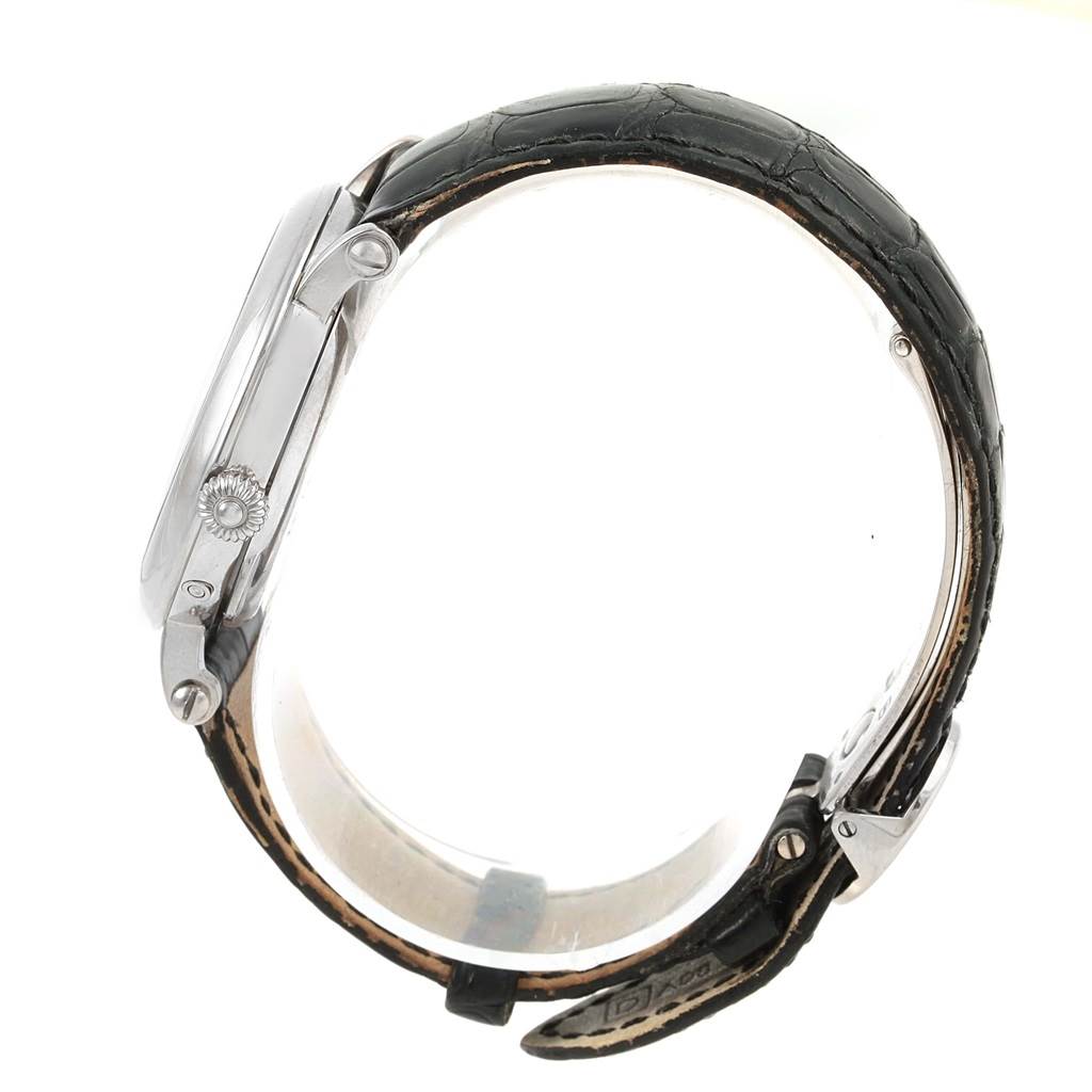 The image shows a side view of the Complications model by Patek Philippe, highlighting its case, crown, and leather strap.