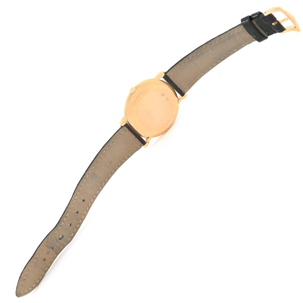 The image shows the back view of a Patek Philippe Calatrava 3919 Men's Rose Gold White Dial 3919 Men's Rose Gold White Dial watch with its strap fully extended.