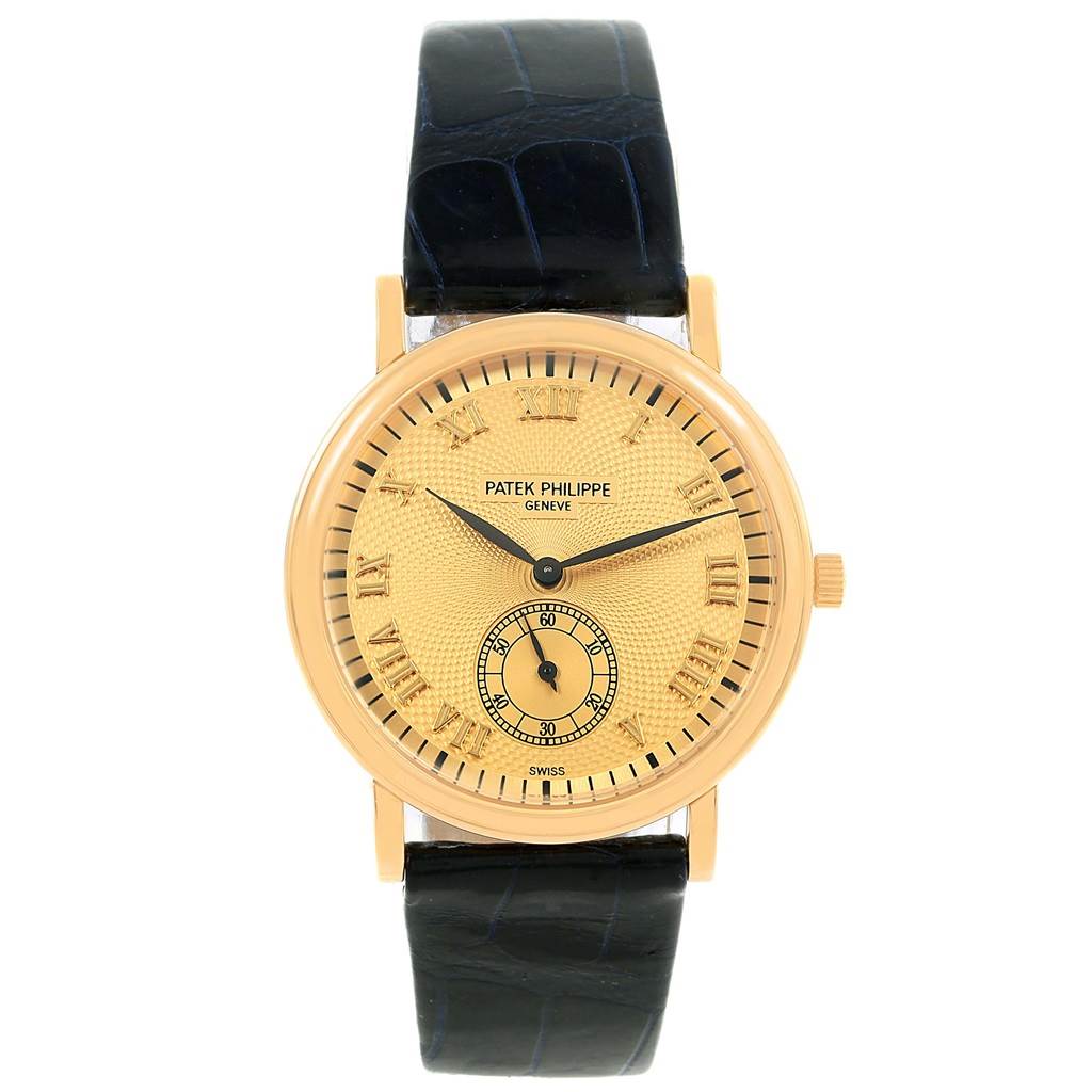 The image shows a front view of the Patek Philippe 5022 Yellow Gold Champagne Dial 5022 Yellow Gold Champagne Dial Calatrava Officier Yellow Gold Manual Wind Watch 5022, displaying its face and strap.