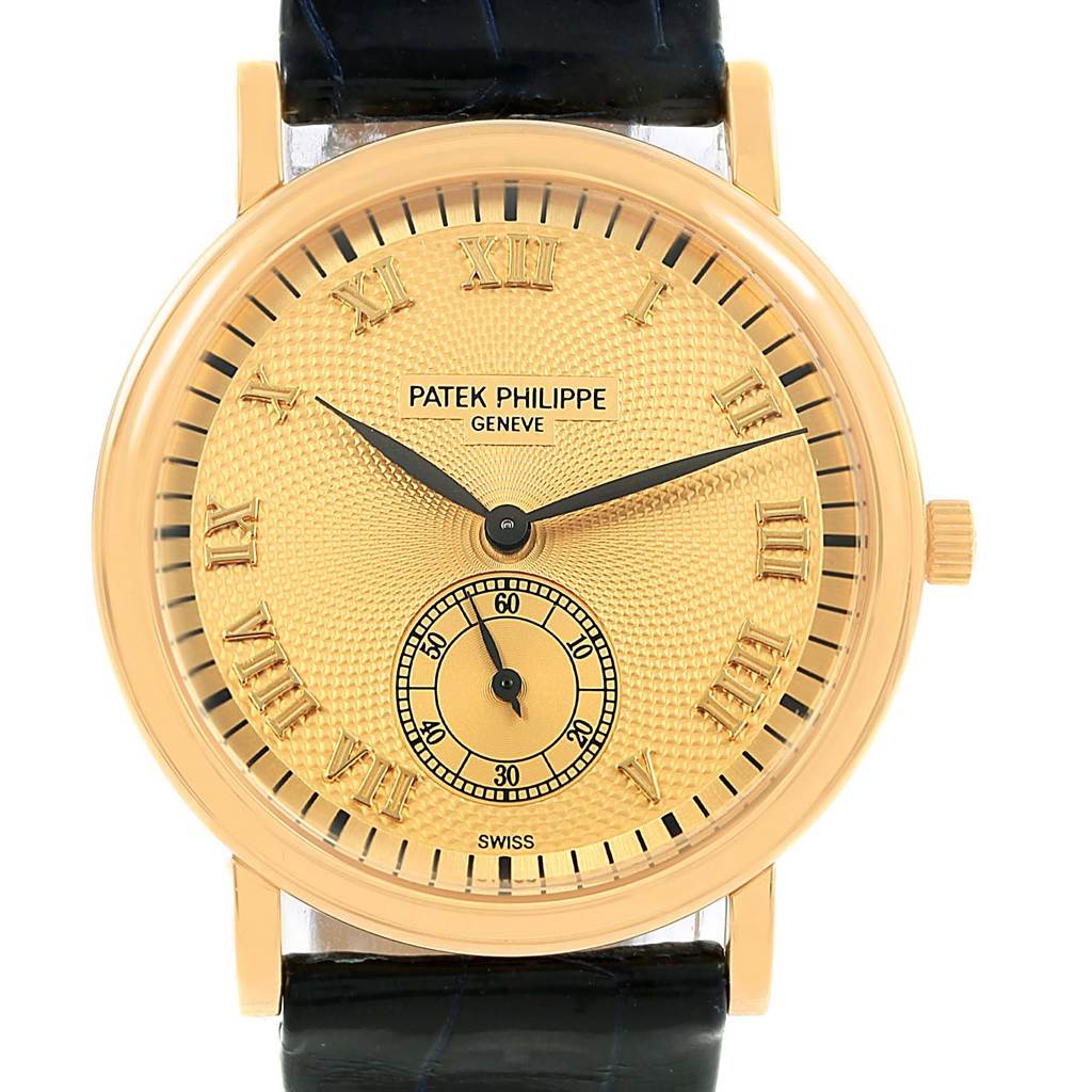 The image shows a front view of the Patek Philippe 5022 Yellow Gold Champagne Dial 5022 Yellow Gold Champagne Dial Calatrava Officier Yellow Gold Manual Wind Watch 5022, highlighting the face, hands, and strap.