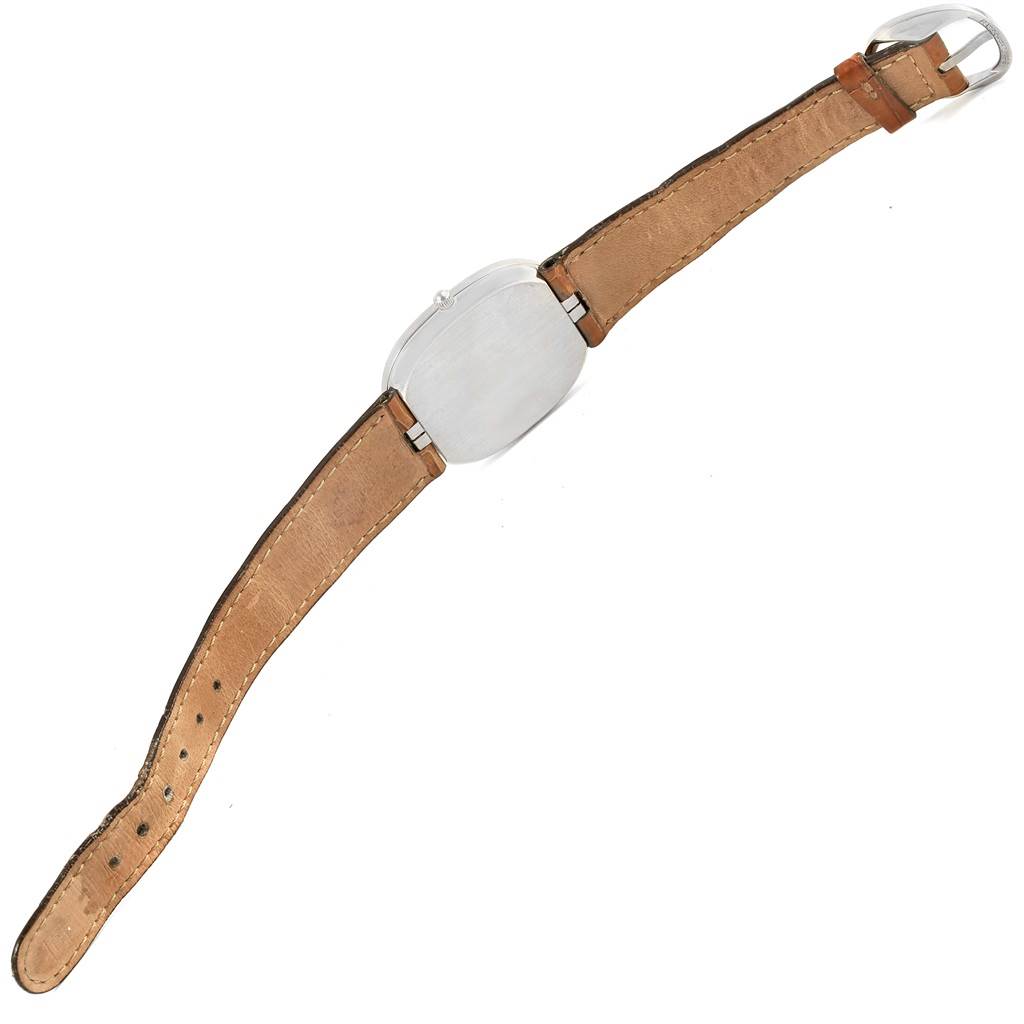 The image shows the back view of a Patek Philippe Golden Ellipse 3738 Men's White Gold Grey Dial 3738 Men's White Gold Grey Dial watch, including its leather strap and buckle.