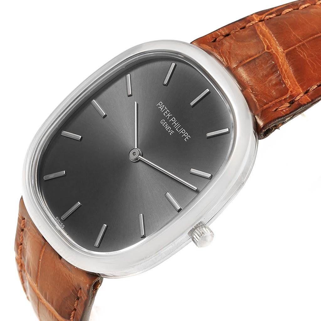 The Patek Philippe Golden Ellipse 3738 Men's White Gold Grey Dial 3738 Men's White Gold Grey Dial model is shown at a slight angle, featuring the dial, hands, bezel, crown, and leather strap.