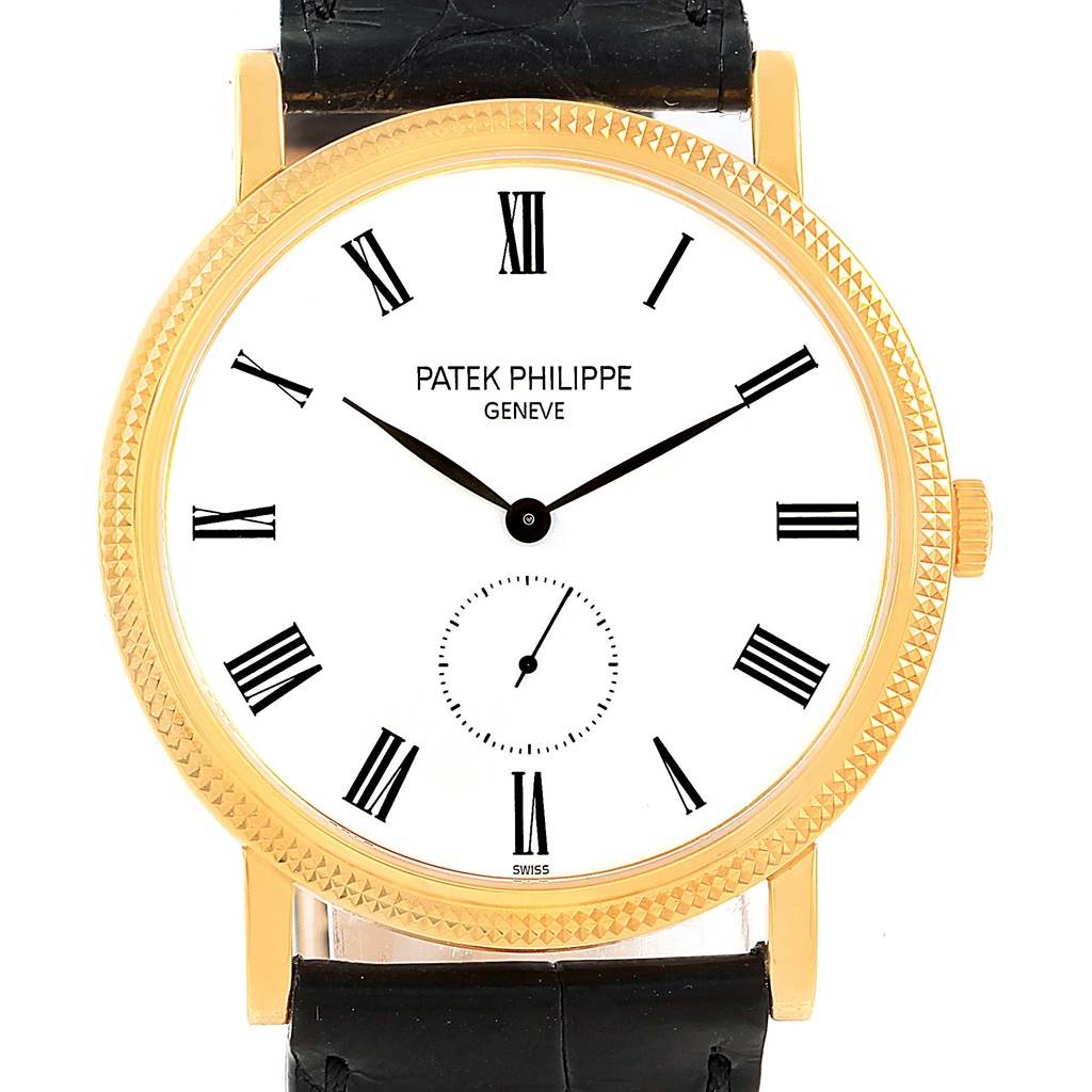 The image shows a frontal view of a Patek Philippe Calatrava 5119J Men's Yellow Gold White Dial 5119J Men's Yellow Gold White Dial watch, highlighting its white dial, Roman numerals, and gold casing.