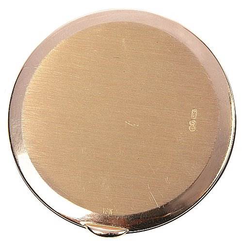 This image shows the case back of the Calatrava model by Patek Philippe at a top-down angle.