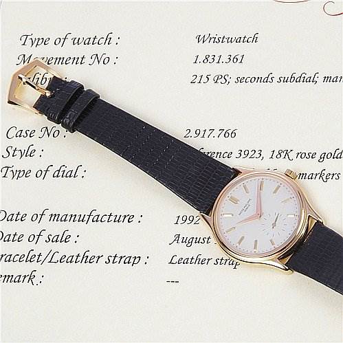 The image shows a Patek Philippe Calatrava 3923 Men's Rose Gold Silver Dial 3923 Men's Rose Gold Silver Dial watch with a black leather strap, displayed flat, revealing the dial and buckle.