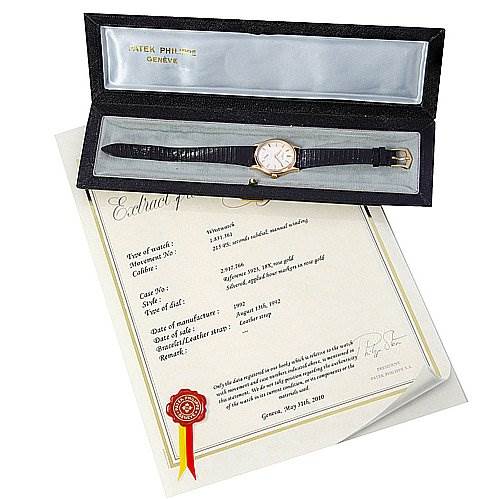 The image shows a Patek Philippe Calatrava 3923 Men's Rose Gold Silver Dial 3923 Men's Rose Gold Silver Dial watch in its case with a certificate of authenticity.