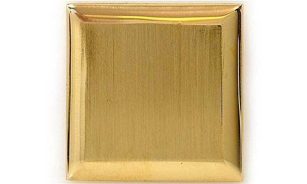 This image shows the square gold dial of a Vintage Patek Philippe watch from a top-down angle.