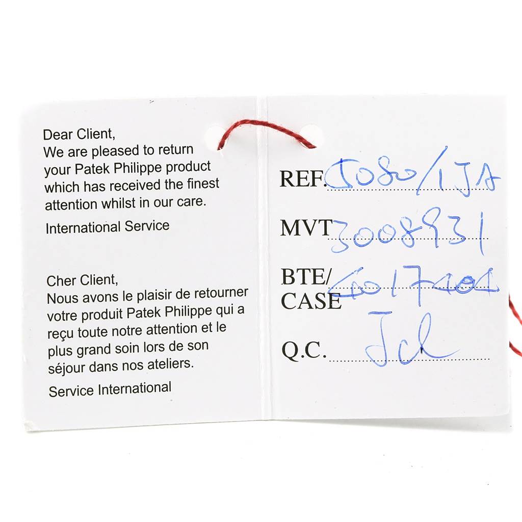 This image shows a Patek Philippe service tag for the Neptune model, detailing the reference, movement, case, and quality control.