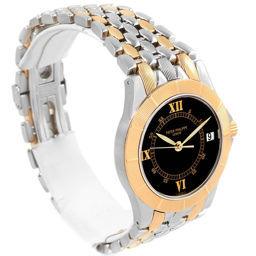 The image shows a side angle of a Patek Philippe Neptune 5080/IJA Men's Steel and Gold (two tone) Black Dial 5080/IJA Men's Steel and Gold (two tone) Black Dial model watch displaying its gold and silver bracelet and black dial.