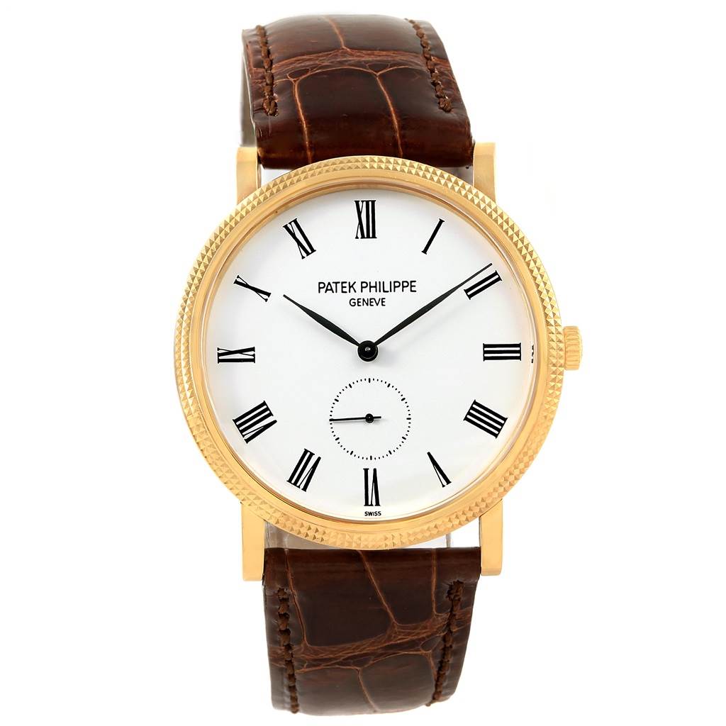The image shows a frontal view of a Patek Philippe Calatrava 5119J Men's Yellow Gold White Dial 5119J Men's Yellow Gold White Dial watch with a white dial and a brown leather strap.