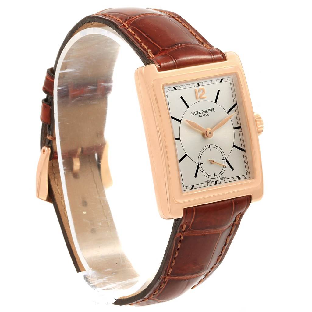 The image shows a Patek Philippe Gondolo 5010R Men's Rose Gold Silver Dial 5010R Men's Rose Gold Silver Dial watch at a front-left angle, highlighting its rectangular dial, brown leather strap, and gold casing.