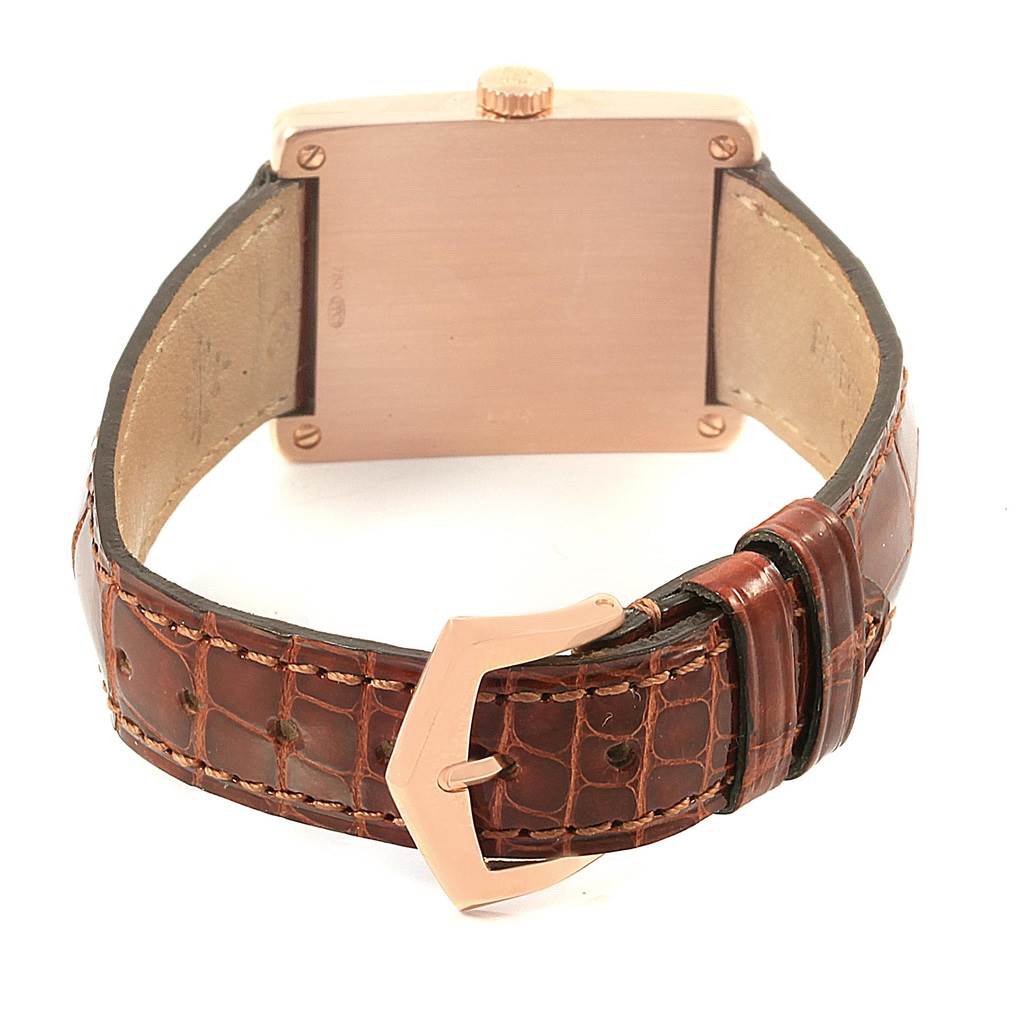 This image shows the back view of a Patek Philippe Gondolo 5010R Men's Rose Gold Silver Dial 5010R Men's Rose Gold Silver Dial watch, focusing on the case back, crown, and leather strap with buckle.