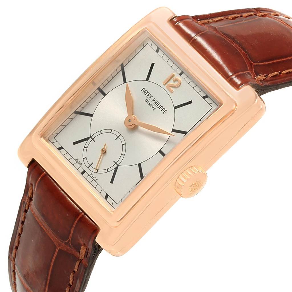 This image shows a Patek Philippe Gondolo 5010R Men's Rose Gold Silver Dial 5010R Men's Rose Gold Silver Dial watch angled from the front, highlighting its face, bezel, crown, and leather strap.