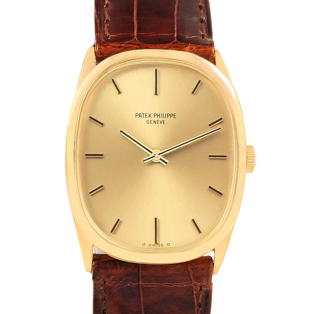 This image shows a front view of the Patek Philippe Golden Ellipse 3546 Men's Yellow Gold Champagne Dial 3546 Men's Yellow Gold Champagne Dial watch, capturing the face, hands, and part of the leather strap.