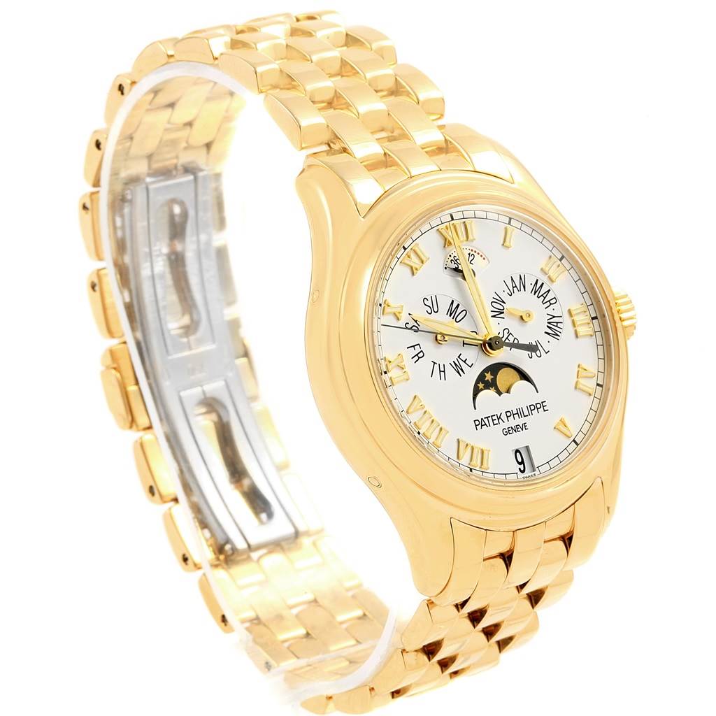 The image shows a Patek Philippe 5036 Men's Yellow Gold White Dial 5036 Men's Yellow Gold White Dial Annual Calendar Moonphase Yellow Gold Watch 5036 from a right-side angle, highlighting the dial and bracelet.