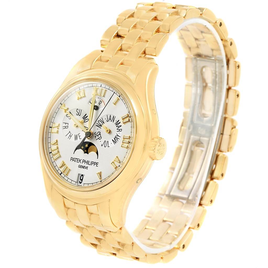 The image shows a Patek Philippe 5036 Men's Yellow Gold White Dial 5036 Men's Yellow Gold White Dial Annual Calendar Moonphase Yellow Gold Watch 5036 from a three-quarter angle highlighting its dial and bracelet.