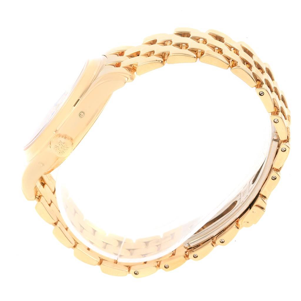 The image shows a side view of the Patek Philippe 5036 Men's Yellow Gold White Dial 5036 Men's Yellow Gold White Dial Annual Calendar Moonphase Yellow Gold Watch 5036, focusing on the bracelet and case side.