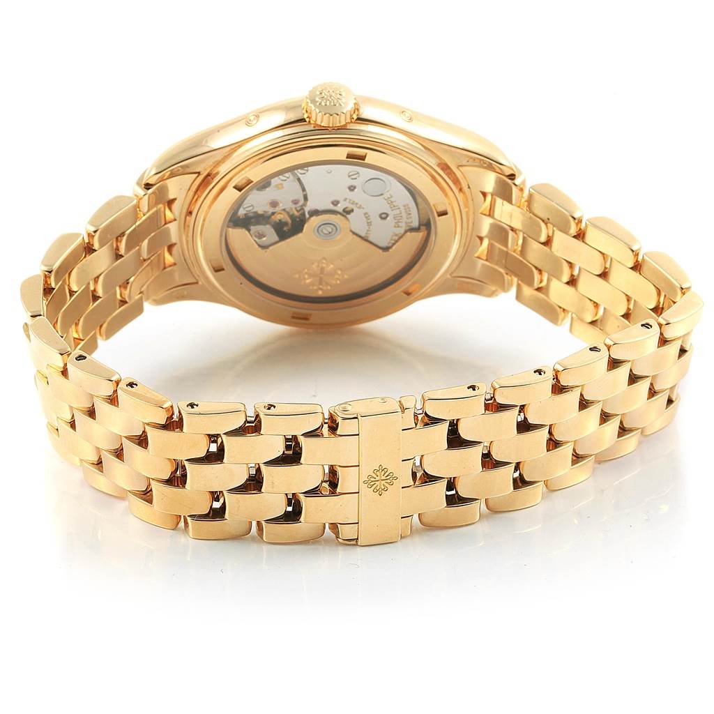 The image shows the back and band of the Patek Philippe 5036 Men's Yellow Gold White Dial 5036 Men's Yellow Gold White Dial Annual Calendar Moonphase Yellow Gold Watch 5036.