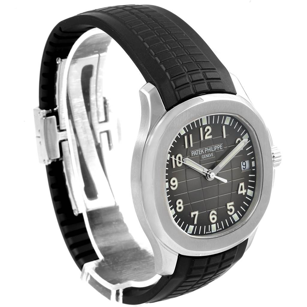 The image shows a Patek Philippe Aquanaut 5167A Men's Stainless Steel Black Dial 5167A Men's Stainless Steel Black Dial model watch at a left-side angle, displaying its black strap, dial, and case.