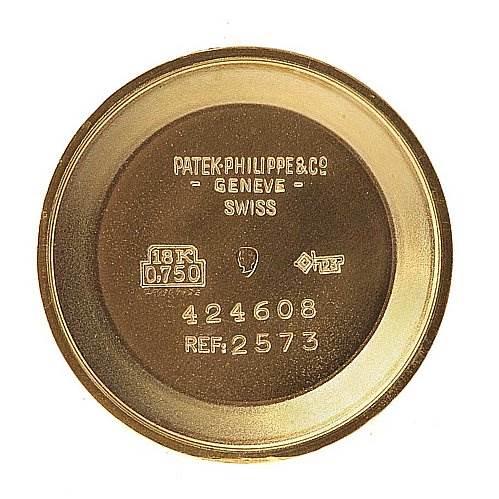 This image shows the inner case back of a vintage Patek Philippe watch, model reference 2573, displaying various engravings and hallmarks.