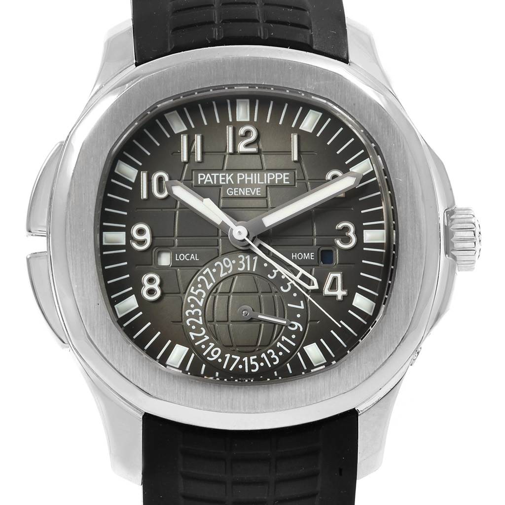 This image features a frontal view of the Patek Philippe Aquanaut 5164A Men's Stainless Steel Black Dial 5164A Men's Stainless Steel Black Dial watch showing the dial, bezel, and part of the strap.