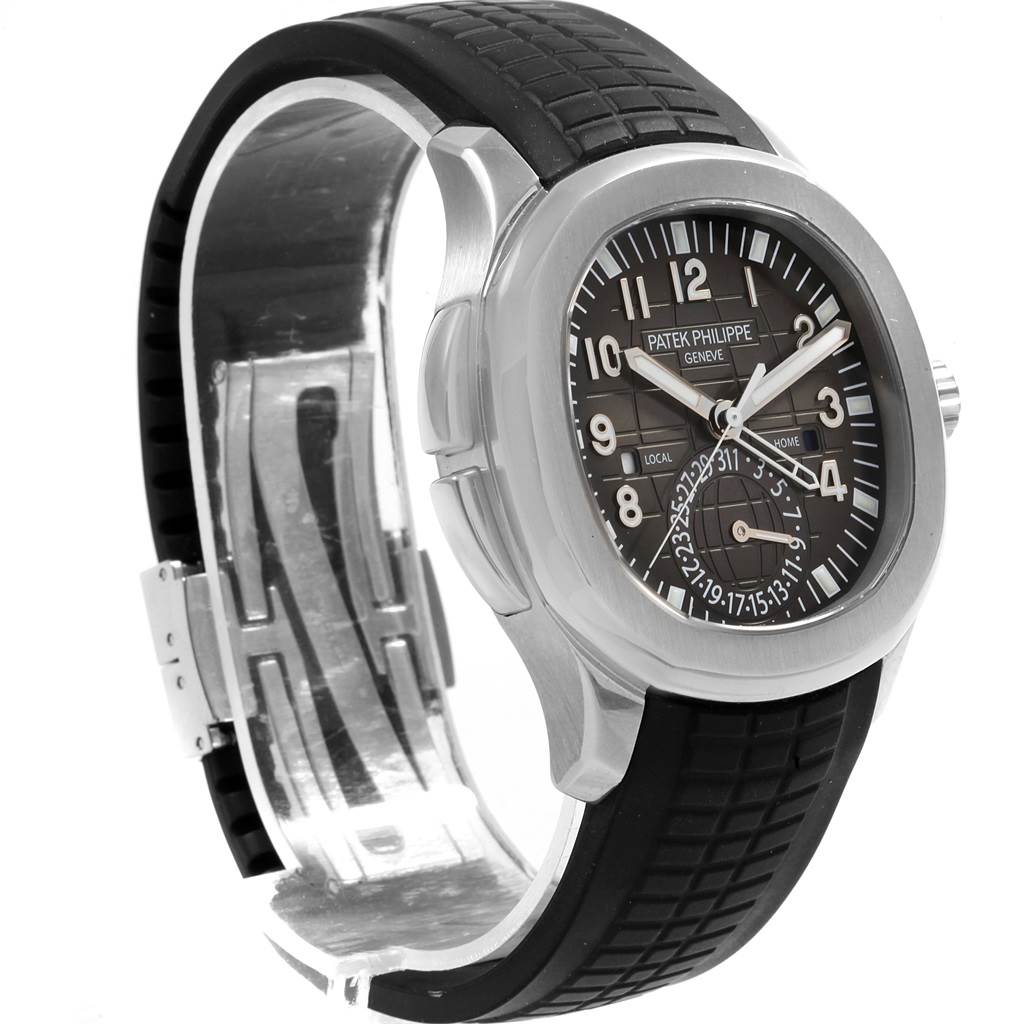The Patek Philippe Aquanaut 5164A Men's Stainless Steel Black Dial 5164A Men's Stainless Steel Black Dial watch is shown at a three-quarter angle, highlighting its dial, bezel, case, and strap.