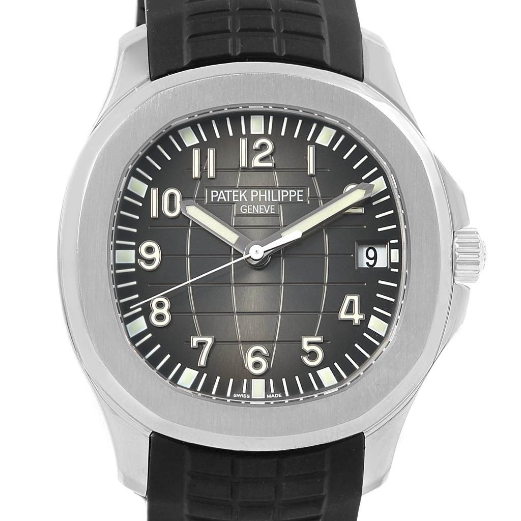 The image shows a front view of the Patek Philippe Aquanaut 5167A Men's Stainless Steel Black Dial 5167A Men's Stainless Steel Black Dial watch, displaying its black dial, rubber strap, and date window.