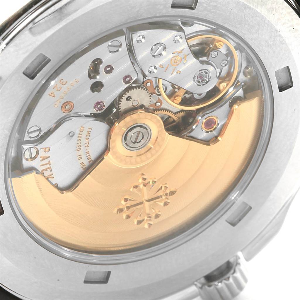 The image shows the back view of a Patek Philippe Aquanaut 5167A Men's Stainless Steel Black Dial 5167A Men's Stainless Steel Black Dial watch, displaying the intricate mechanical movement and rotor.