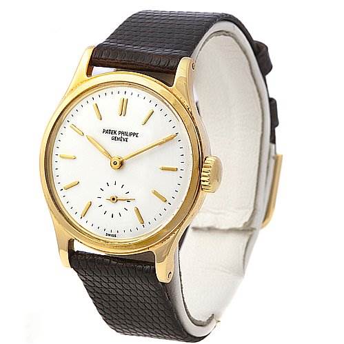 This image shows a Patek Philippe Vintage watch from an angled front view, highlighting the dial, bezel, crown, and strap.