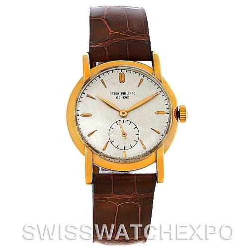 The image shows a front view of a Vintage Patek Philippe watch, featuring a gold case, white dial, brown leather strap, and small seconds sub-dial.