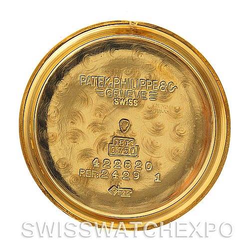 The image shows the inner case back of a Vintage Patek Philippe watch with various engravings.
