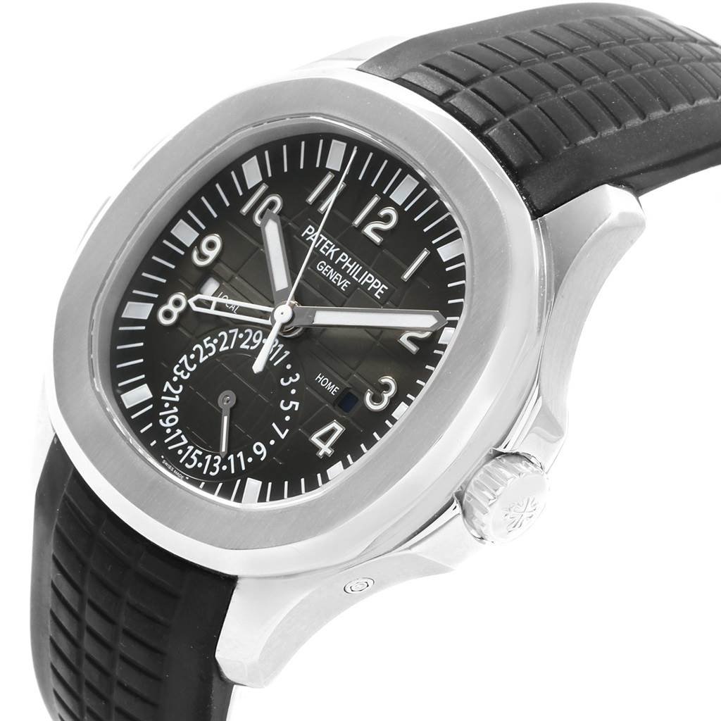The image shows a Patek Philippe Aquanaut 5164A Men's Stainless Steel Black Dial 5164A Men's Stainless Steel Black Dial watch from a front-angle view, displaying its dial, bezel, and crown.