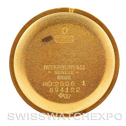 This image shows the inside case back of a Vintage Patek Philippe watch, showcasing the brand's inscription and reference numbers.