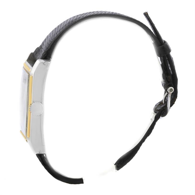 The image shows a side view of a Vintage Patek Philippe watch, highlighting the case, crown, and strap.