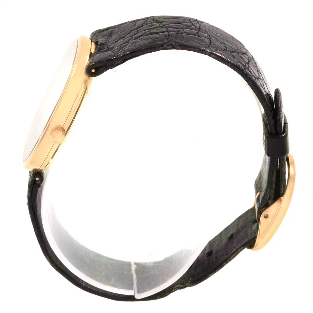 The image shows a side profile of the Patek Philippe Golden Ellipse 3788 Men's Yellow Gold Blue Dial 3788 Men's Yellow Gold Blue Dial watch, highlighting the strap and crown.