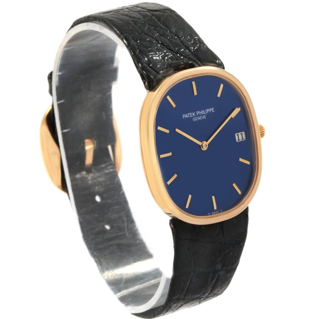 The image shows a Patek Philippe Golden Ellipse 3788 Men's Yellow Gold Blue Dial 3788 Men's Yellow Gold Blue Dial watch at a three-quarter angle, highlighting its blue dial, gold case, and black strap.