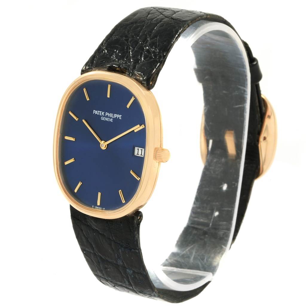 The image shows a Patek Philippe Golden Ellipse 3788 Men's Yellow Gold Blue Dial 3788 Men's Yellow Gold Blue Dial watch, angled to display the face, side, and black strap.