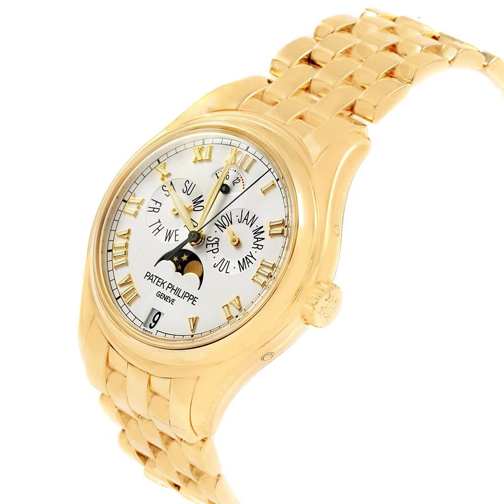 The image shows a front-left angled view of the Patek Philippe 5036 Men's Yellow Gold White Dial 5036 Men's Yellow Gold White Dial Annual Calendar Moonphase Yellow Gold Men's Watch 5036, displaying the dial and bracelet.