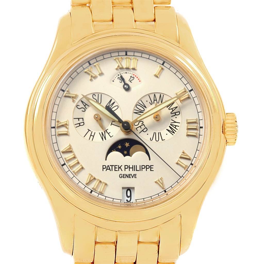The Patek Philippe 5036 Men's Yellow Gold White Dial 5036 Men's Yellow Gold White Dial Annual Calendar Moonphase Yellow Gold Mens Watch 5036 is shown from a front angle, displaying its dial and bracelet.