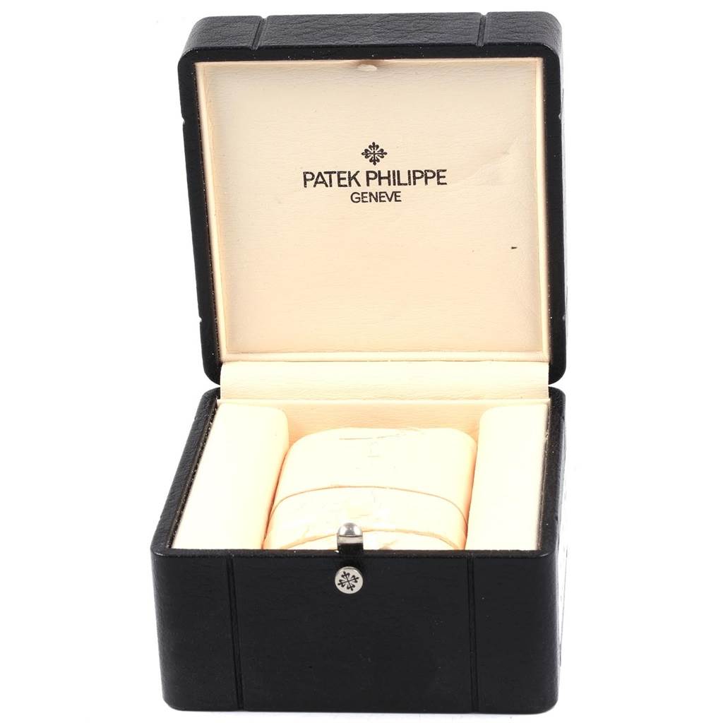 The image shows the open box of the Patek Philippe Nautilus 3710/1A Men's Stainless Steel Black Dial 3710/1A Men's Stainless Steel Black Dial, displaying the interior padding.