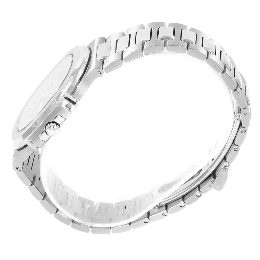 The image shows the side view of a Patek Philippe Nautilus 3710/1A Men's Stainless Steel Black Dial 3710/1A Men's Stainless Steel Black Dial watch, highlighting its case, crown, and metal bracelet.