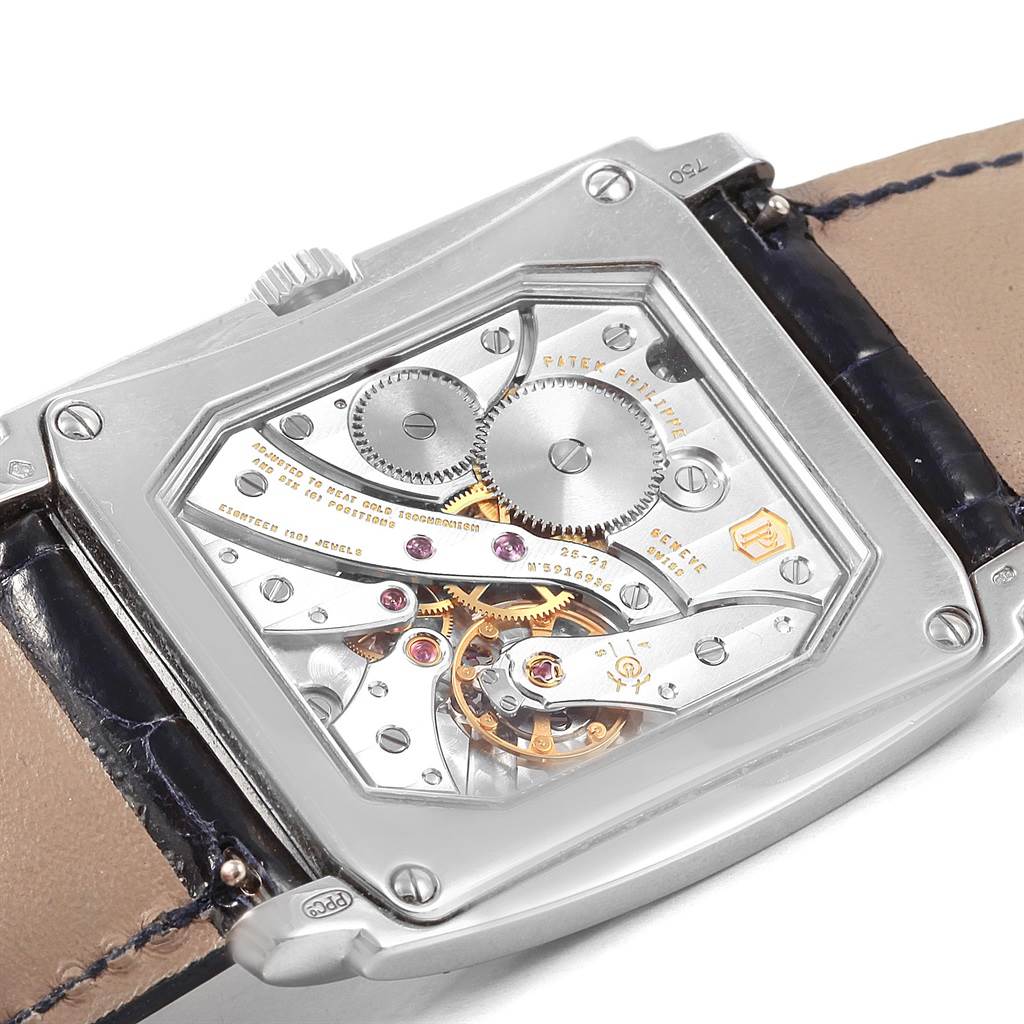 The image shows the back view of a Patek Philippe Gondolo 5124G Men's White Gold Blue Dial 5124G Men's White Gold Blue Dial watch, displaying its internal mechanical components.