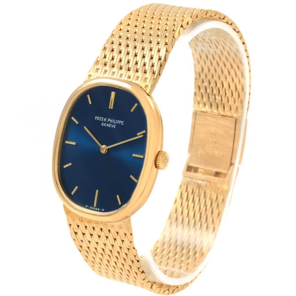 The image showcases a Patek Philippe Golden Ellipse 3548 Men's Yellow Gold Blue Dial 3548 Men's Yellow Gold Blue Dial watch viewed at a slight angle from the front, displaying the dial, case, and bracelet.