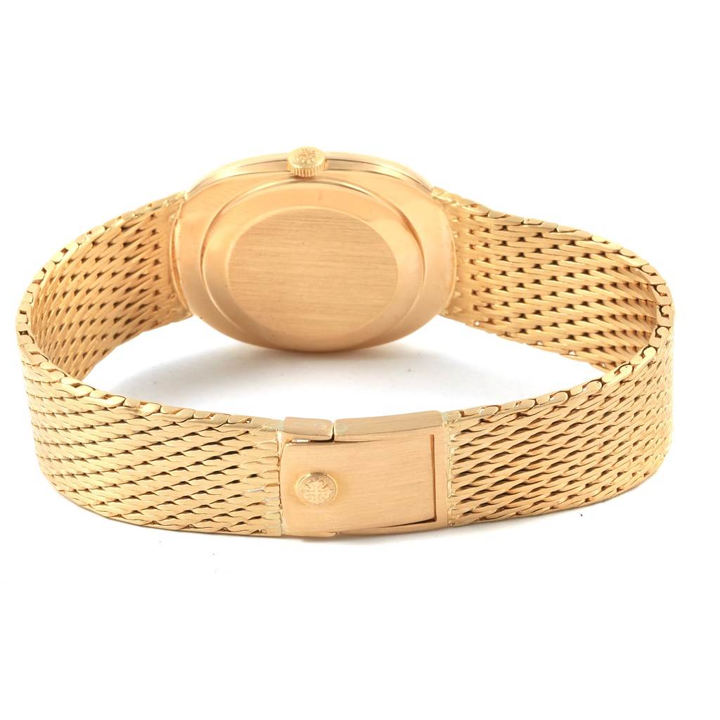 This image shows the back view of the Patek Philippe Golden Ellipse 3548 Men's Yellow Gold Blue Dial 3548 Men's Yellow Gold Blue Dial watch, highlighting its clasp and mesh strap.