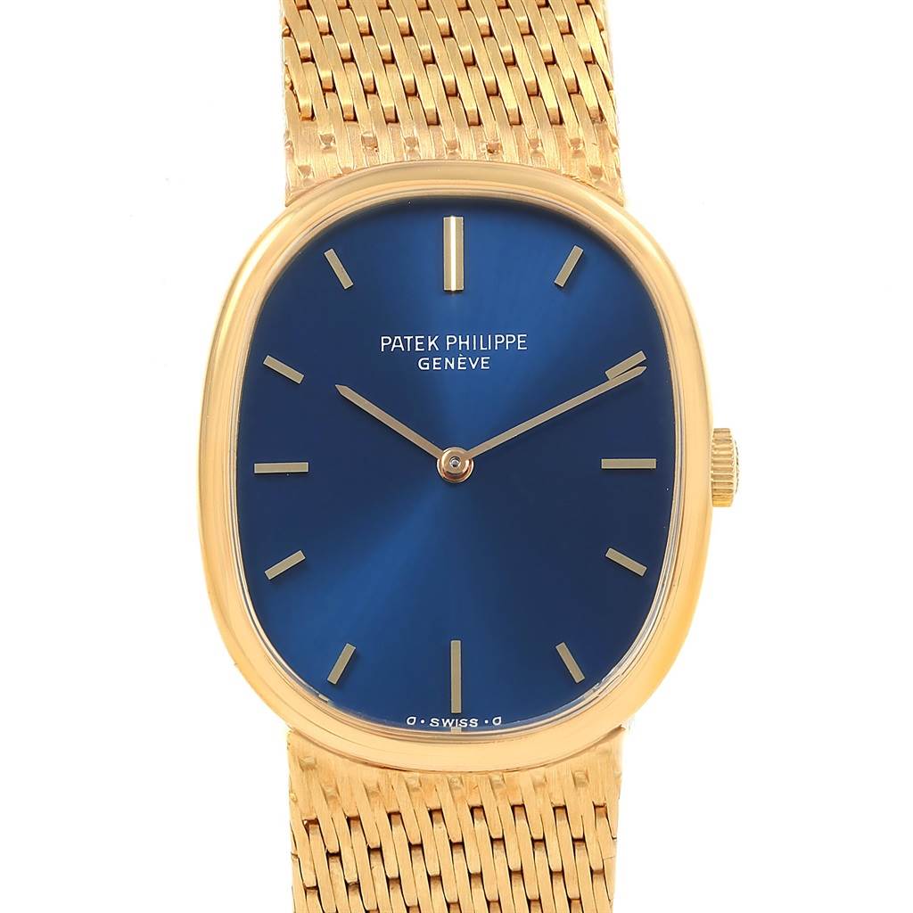 This image shows a front view of the Patek Philippe Golden Ellipse 3548 Men's Yellow Gold Blue Dial 3548 Men's Yellow Gold Blue Dial watch, displaying its oval dial, blue face, and gold mesh bracelet.
