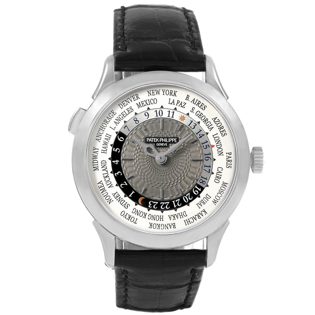 This Patek Philippe Complications 5230G Men's White Gold Grey Dial 5230G Men's White Gold Grey Dial model watch is shown from a front angle, displaying the face, time zones, and black leather strap.
