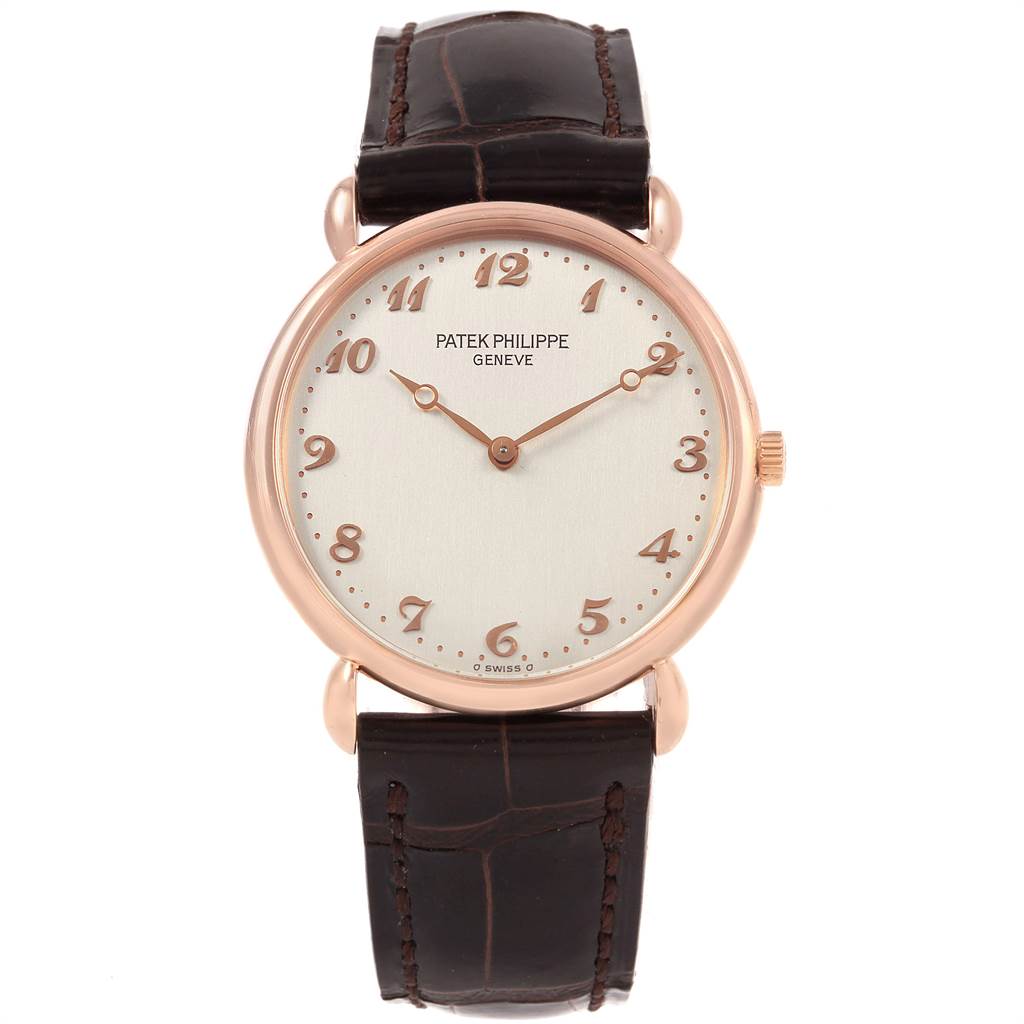 The image shows a front view of a Vintage Patek Philippe watch, displaying its dial, hands, case, and leather strap.